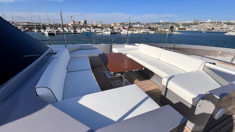 Aquila Yacht Photos Pics Luxurious seating area on 2015 Mengi Yay 36M Pennon yacht, overlooking marina.