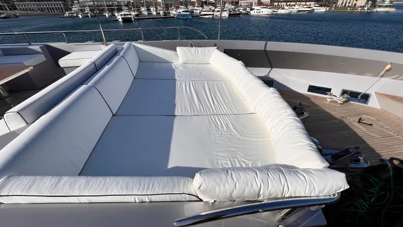 Aquila Yacht Photos Pics Luxurious deck seating on 2015 Mengi Yay 36M Pennon yacht, overlooking marina.