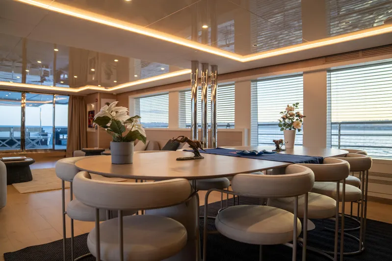 Aquila Yacht Photos Pics Luxurious interior of 2015 Mengi Yay 36M Pennon yacht with elegant dining area.
