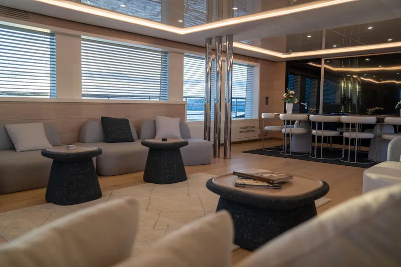 Aquila Yacht Photos Pics Luxurious interior of 2015 Mengi Yay 36M Pennon yacht with modern seating and elegant decor.