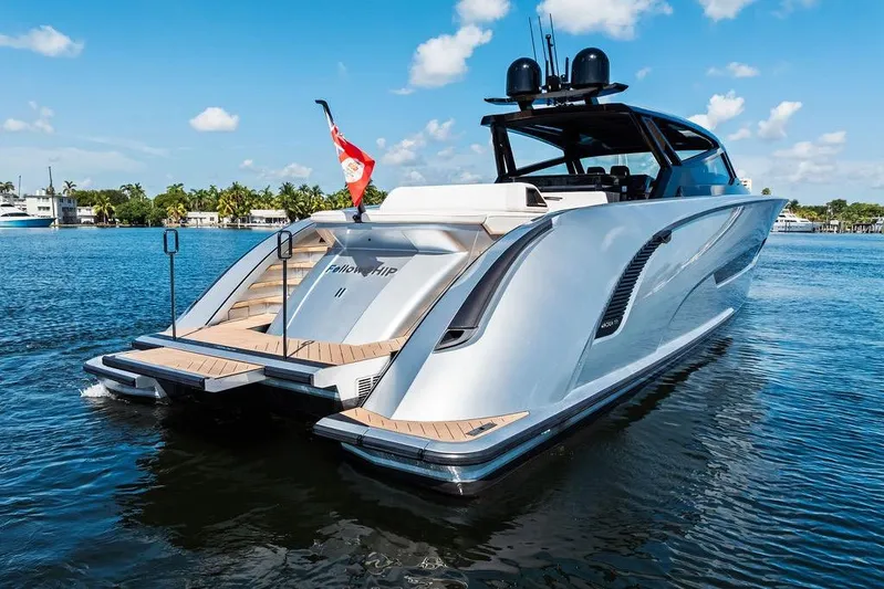 Fellowship II Yacht Photos Pics Luxury 2023 Wajer 77 yacht on water, sleek design, sunny day.