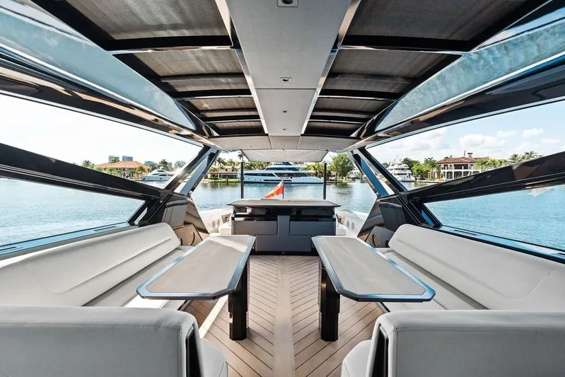 Fellowship II Yacht Photos Pics Luxurious interior of 2023 Wajer 77 yacht with elegant seating and scenic water views.