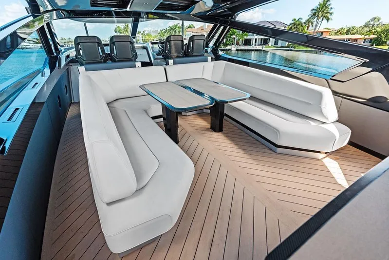 Fellowship II Yacht Photos Pics Luxurious 2023 Wajer 77 yacht interior with sleek seating and modern design.