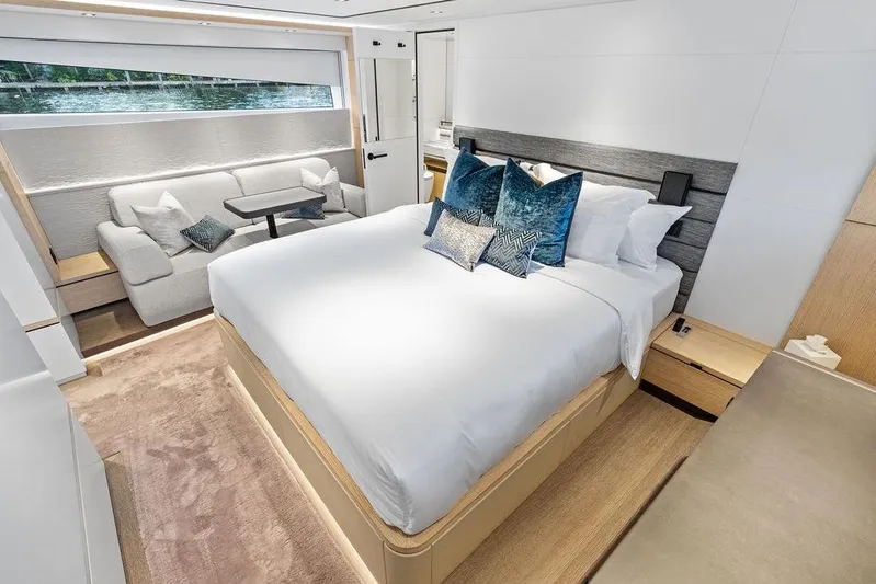 Fellowship II Yacht Photos Pics Luxurious bedroom interior of 2023 Wajer 77 yacht with elegant furnishings and modern design.