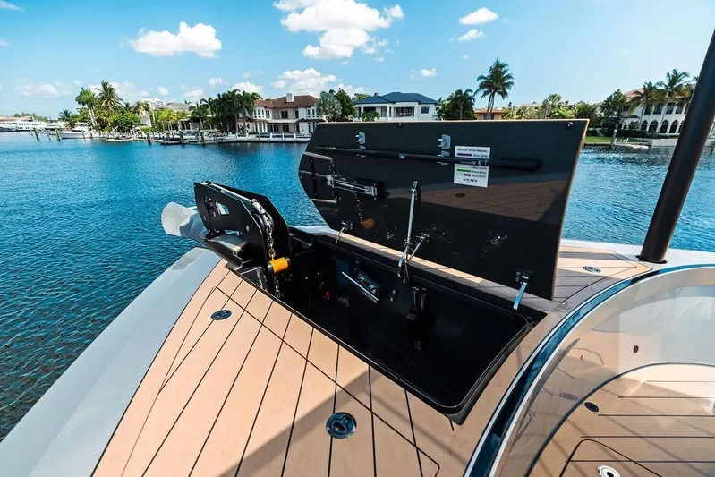 Fellowship II Yacht Photos Pics Luxury Wajer 77 yacht deck with open storage compartment, 2023 model, by scenic waterfront homes.