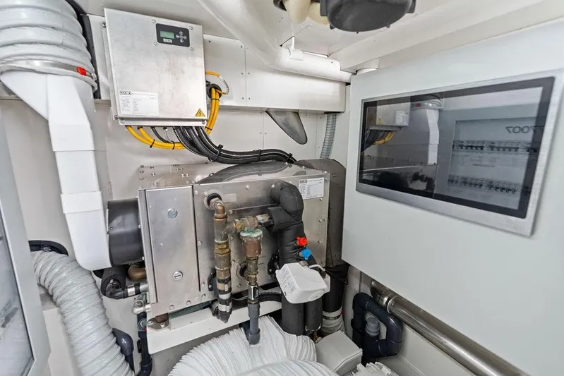 Fellowship II Yacht Photos Pics Engine room of 2023 Wajer 77 yacht, featuring advanced mechanical systems and control panel.