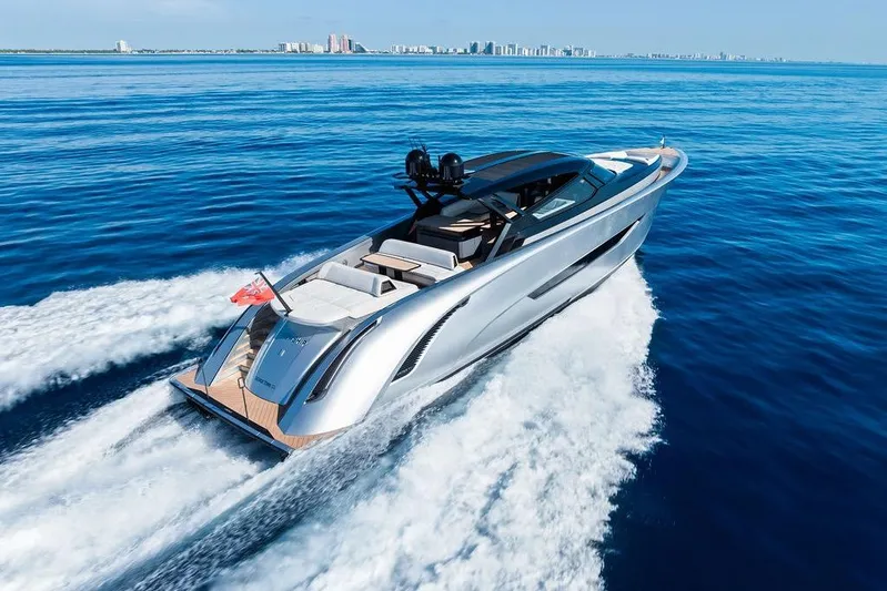 Fellowship II Yacht Photos Pics 2023 Wajer 77 yacht cruising on open blue sea, showcasing sleek design and luxury.