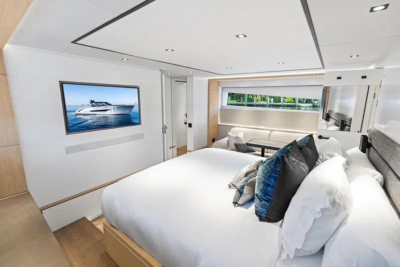 Fellowship II Yacht Photos Pics Luxurious interior of 2023 Wajer 77 yacht with elegant bedroom and modern decor.