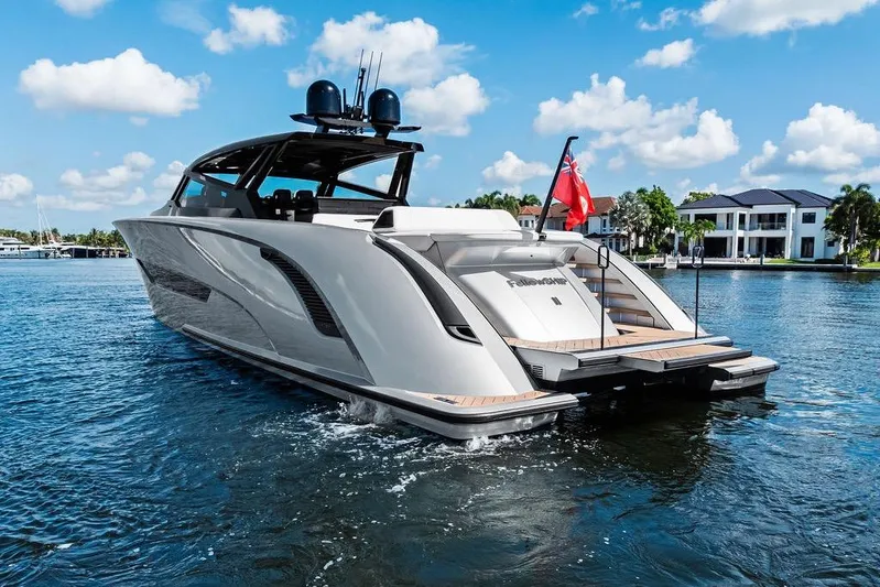Fellowship II Yacht Photos Pics Luxury 2023 Wajer 77 yacht cruising on a sunny day, showcasing sleek design and elegance.