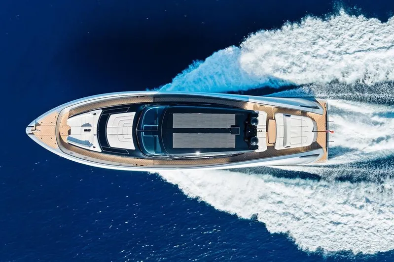 Fellowship II Yacht Photos Pics Aerial view of 2023 Wajer 77 yacht cruising on blue ocean waters.