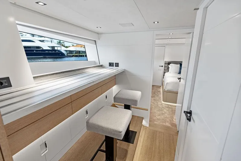 Fellowship II Yacht Photos Pics Luxurious interior of 2023 Wajer 77 yacht, featuring modern seating and sleek design elements.