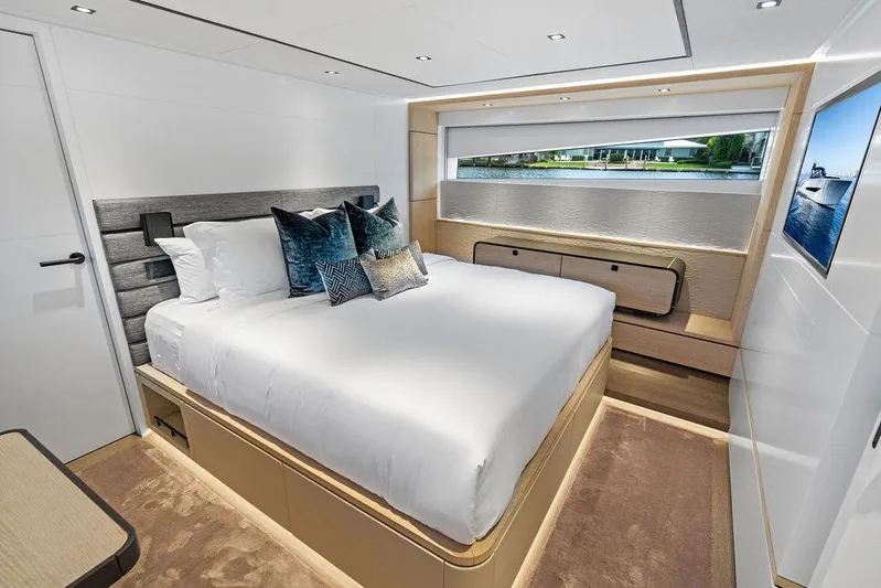 Fellowship II Yacht Photos Pics Luxurious bedroom interior of 2023 Wajer 77 yacht with modern design and elegant decor.