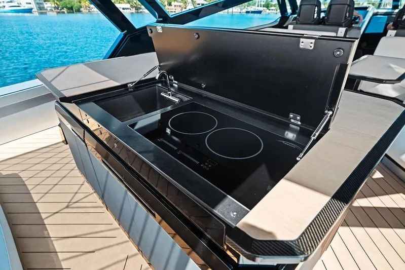 Fellowship II Yacht Photos Pics Luxury yacht Wajer 77 (2023) featuring a sleek outdoor kitchen with induction cooktop.