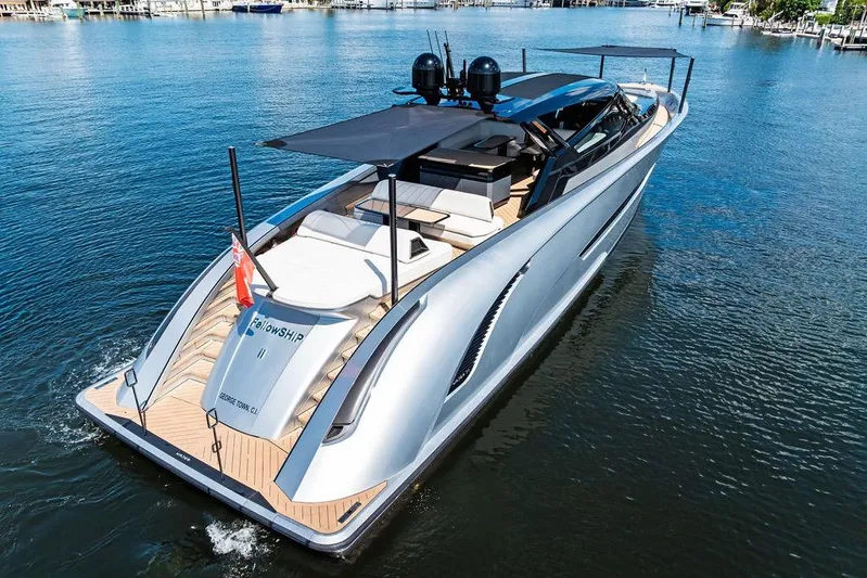 Fellowship II Yacht Photos Pics Luxury 2023 Wajer 77 yacht cruising on serene waters, showcasing sleek design and elegance.