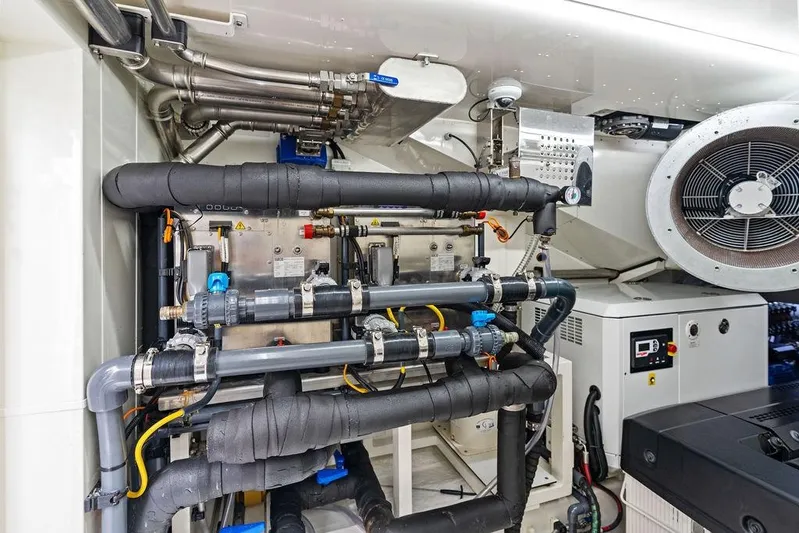 Fellowship II Yacht Photos Pics Engine room of 2023 Wajer 77 yacht, showcasing complex piping and machinery.