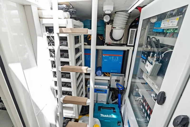 Fellowship II Yacht Photos Pics Engine room of 2023 Wajer 77 yacht with electrical equipment and storage.
