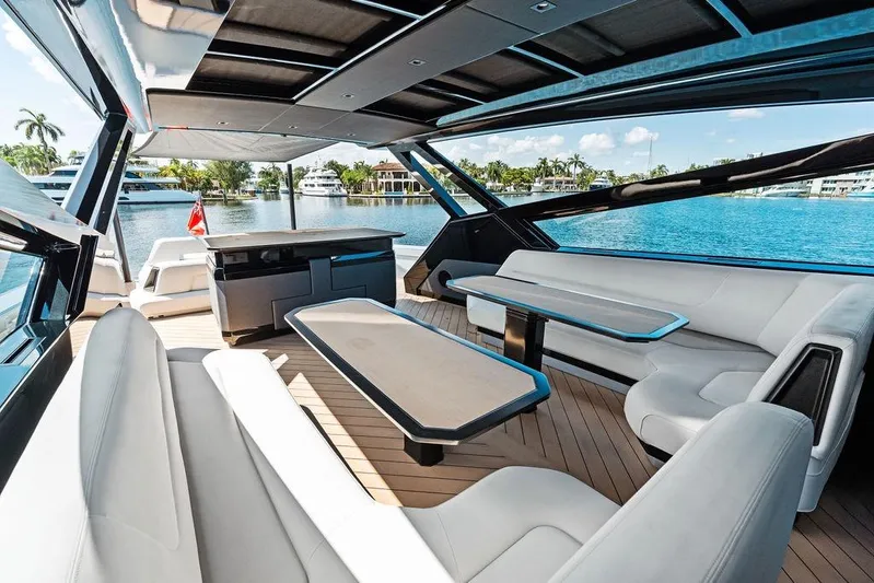 Fellowship II Yacht Photos Pics Luxurious interior of 2023 Wajer 77 yacht with sleek seating and waterfront view.