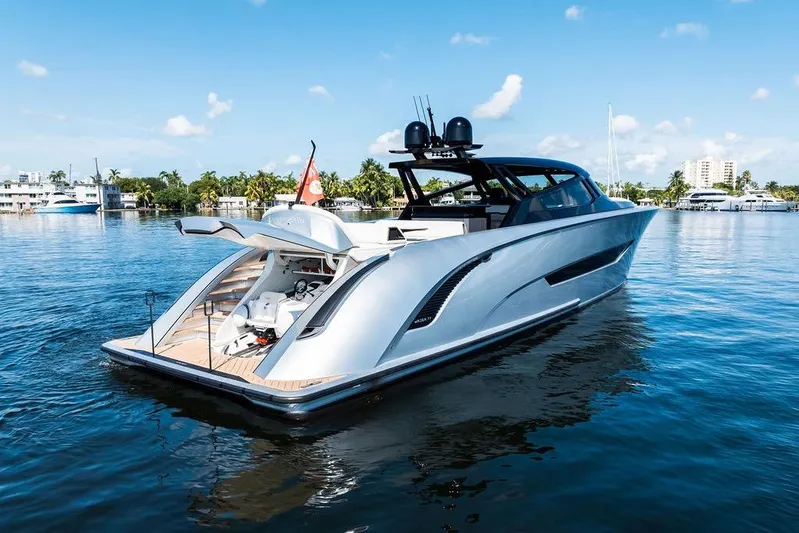 Fellowship II Yacht Photos Pics Luxurious 2023 Wajer 77 yacht on serene water, showcasing sleek design and modern features.