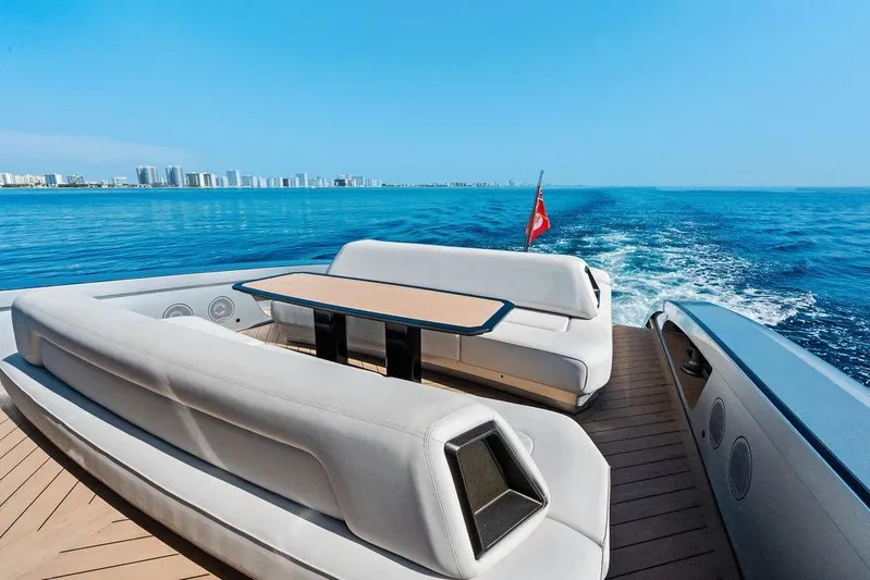 Fellowship II Yacht Photos Pics Luxurious 2023 Wajer 77 yacht cruising with city skyline in the background.