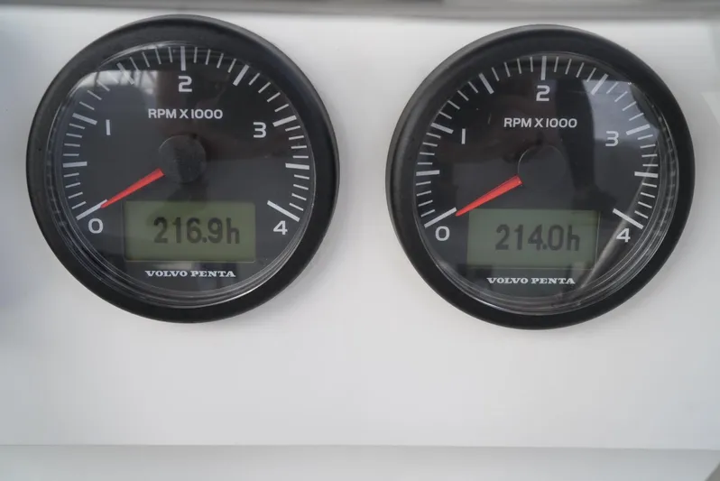 Elysium 1 Yacht Photos Pics Dual RPM gauges on 2022 Fountaine Pajot Elba Quatour, showing 216.9h and 214.0h.
