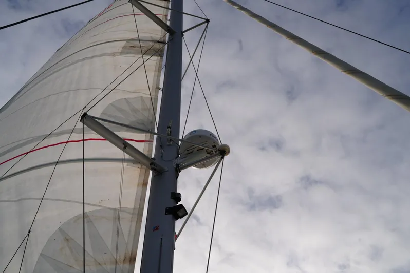 Elysium 1 Yacht Photos Pics Sail of 2022 Fountaine Pajot Elba Quatour against cloudy sky.