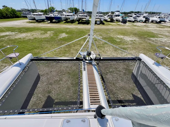 Gods Grace Yacht Photos Pics Catamaran deck view of 2010 Voyage Yachts 500, with marina in background.
