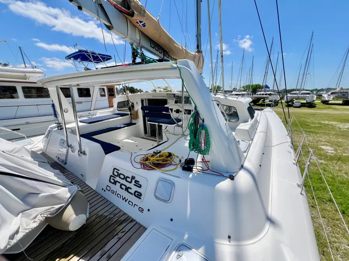 Gods Grace Yacht Photos Pics Voyage Yachts 500 sailboat, 2010 model, docked with clear skies and marina view.