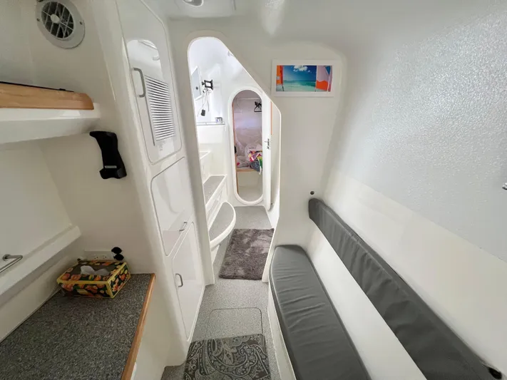 Gods Grace Yacht Photos Pics Interior of 2010 Voyage Yachts 500, featuring sleek white design and comfortable seating.