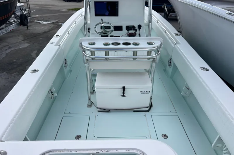  Yacht Photos Pics 2013 Contender 28 Sport boat interior with console and seating.