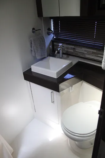 Skywalker Yacht Photos Pics Modern bathroom in 2018 Carver C43 Coupe with sink, toilet, and sleek design.