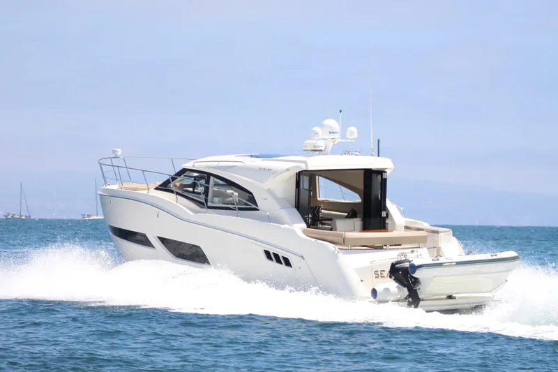Skywalker Yacht Photos Pics Luxurious 2018 Carver C43 Coupe yacht cruising on open water.