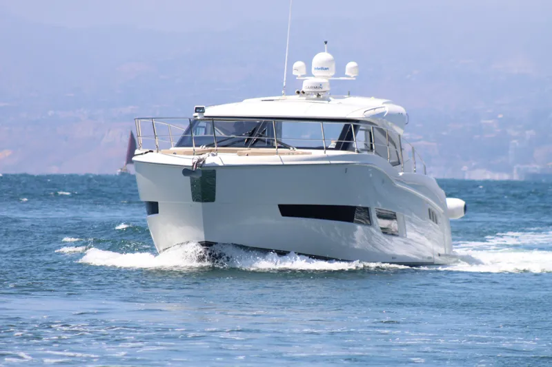 Skywalker Yacht Photos Pics A luxurious yacht cruising on the ocean, showcasing sleek design and modern features.