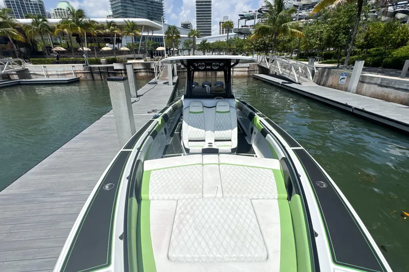  Yacht Photos Pics 2018 Statement 380 Open boat docked, featuring sleek design and modern seating.