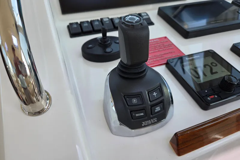 Eagle Wing Yacht Photos Pics Control panel of 2017 MJM 40z Downeast boat with joystick and display.