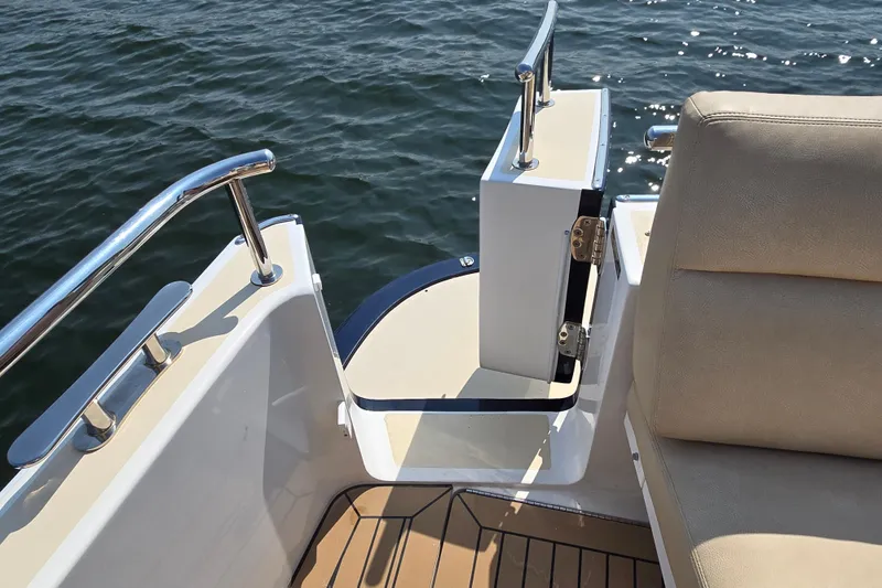 Eagle Wing Yacht Photos Pics 2017 MJM 40z Downeast boat with open transom gate and cushioned seating.