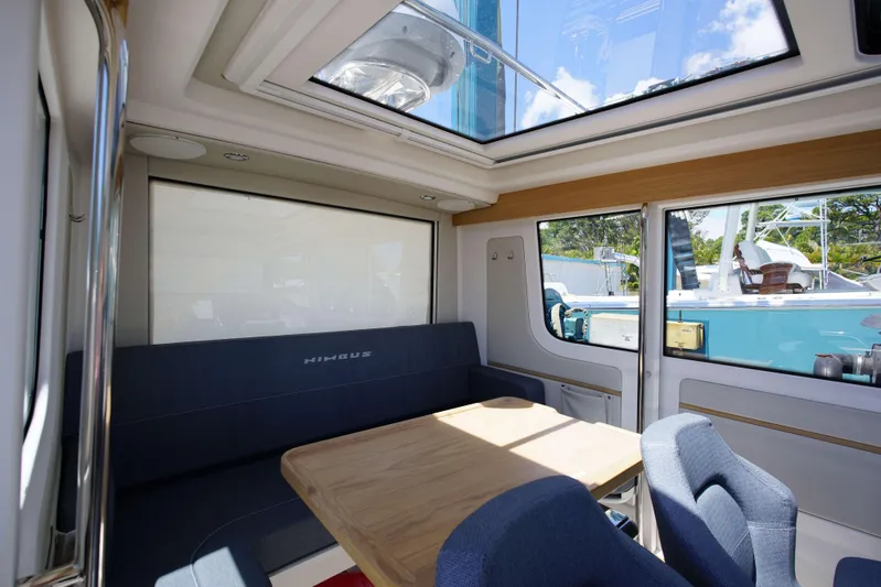 In-stock 2024 Nimbus C9 #158 Yacht Photos Pics Interior of 2024 Nimbus Commuter 9 #158 with skylight and seating area.