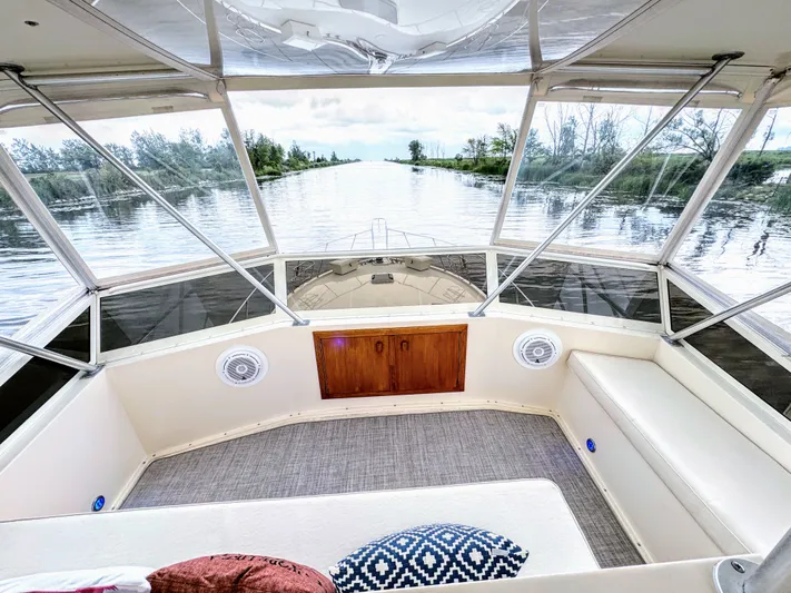 Sunshine State Yacht Photos Pics Interior view of 1987 Viking 48 Motoryacht on calm waters.