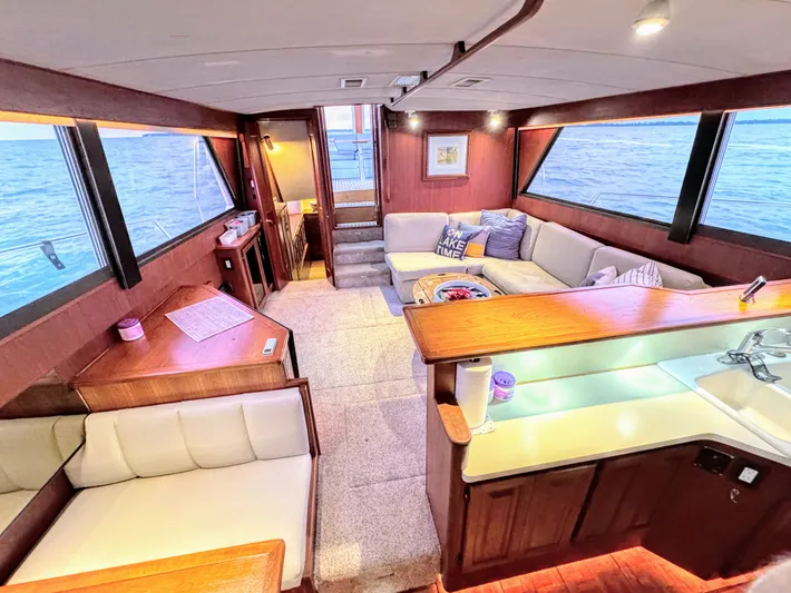 Sunshine State Yacht Photos Pics Interior of 1987 Viking 48 Motoryacht with cozy living area.