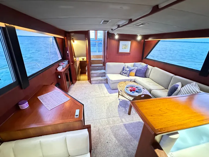 Sunshine State Yacht Photos Pics Interior of 1987 Viking 48 Motoryacht with cozy seating area.