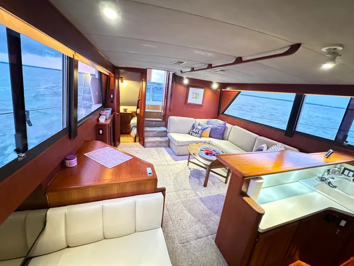 Sunshine State Yacht Photos Pics Interior of 1987 Viking 48 Motoryacht featuring cozy living area.
