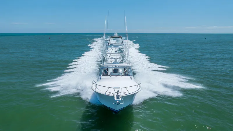 Life Is Good Yacht Photos Pics Viking 42 yacht cruising on open sea, 2013 model, creating a dynamic water trail.