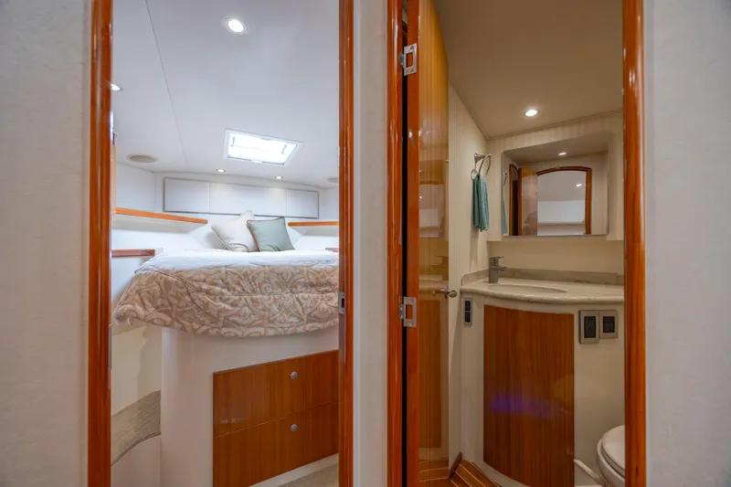 Life Is Good Yacht Photos Pics Luxurious 2013 Viking 42 yacht interior with cozy bedroom and modern bathroom.