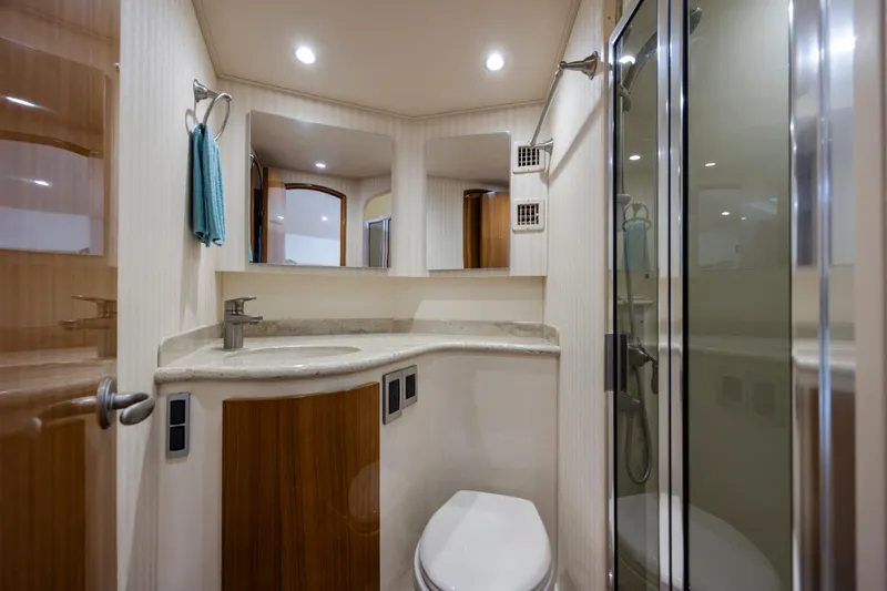 Life Is Good Yacht Photos Pics Luxurious bathroom in 2013 Viking 42 yacht with modern fixtures and shower.