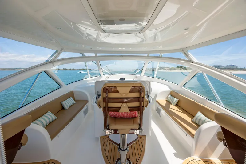 Life Is Good Yacht Photos Pics Luxurious 2013 Viking 42 yacht interior with panoramic windows and plush seating.