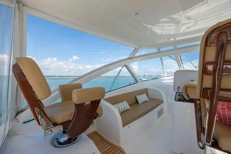 Life Is Good Yacht Photos Pics Luxurious interior of 2013 Viking 42 yacht with plush seating and ocean view.