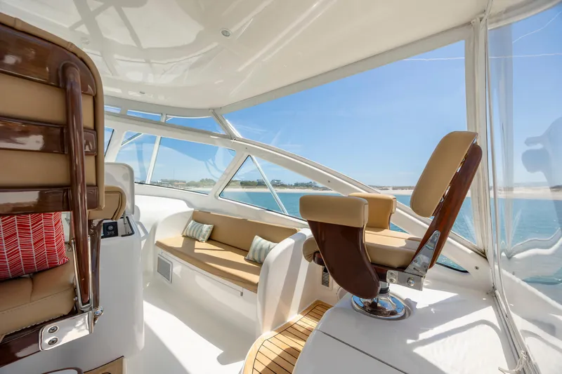 Life Is Good Yacht Photos Pics Luxurious interior of 2013 Viking 42 yacht with plush seating and ocean view.