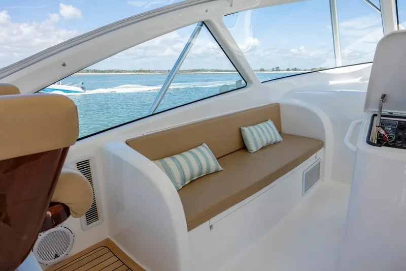 Life Is Good Yacht Photos Pics Luxurious interior of 2013 Viking 42 yacht with comfortable seating and scenic ocean view.