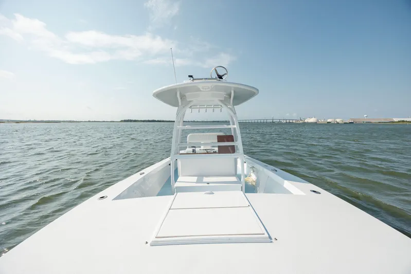  Yacht Photos Pics 2019 Gamefisherman 26 Cuddy Cabin boat on open water.