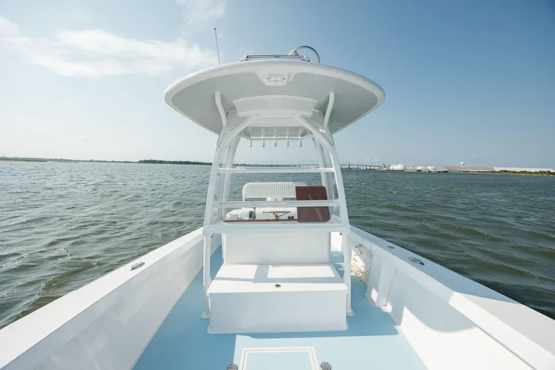  Yacht Photos Pics 2019 Gamefisherman 26 Cuddy Cabin boat on open water.