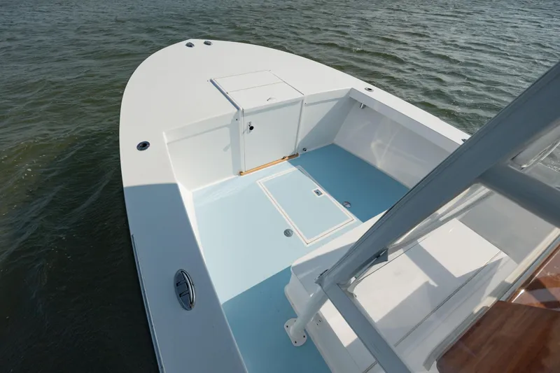  Yacht Photos Pics 2019 Gamefisherman 26 Cuddy Cabin boat deck on water.